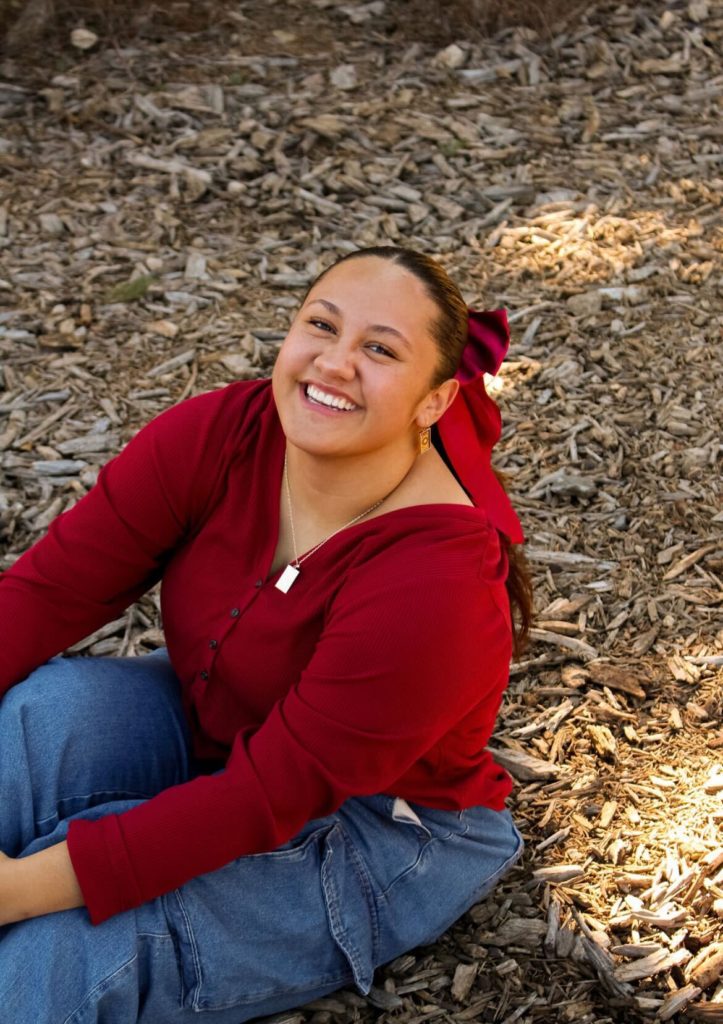 Ari, A picture of her genuine smile taken at her senior photoshoot 